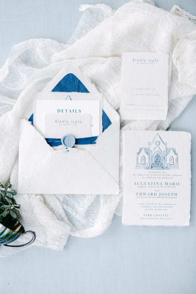 White and blue wedding day invitations by Inquisted.