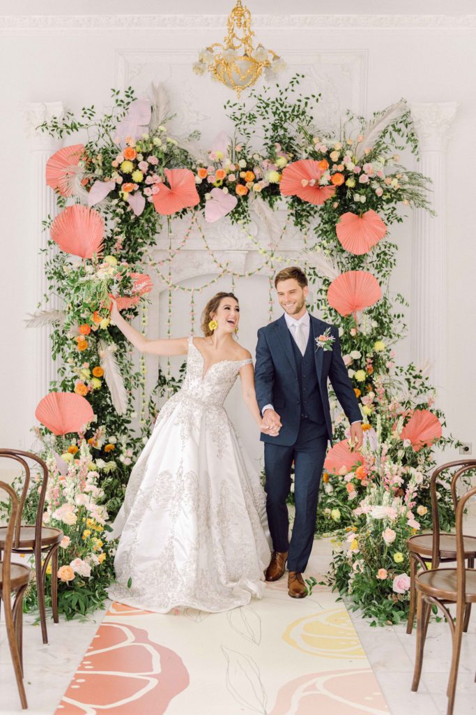 Citrus themed wedding. Pink, yellow, orange wedding flowers.